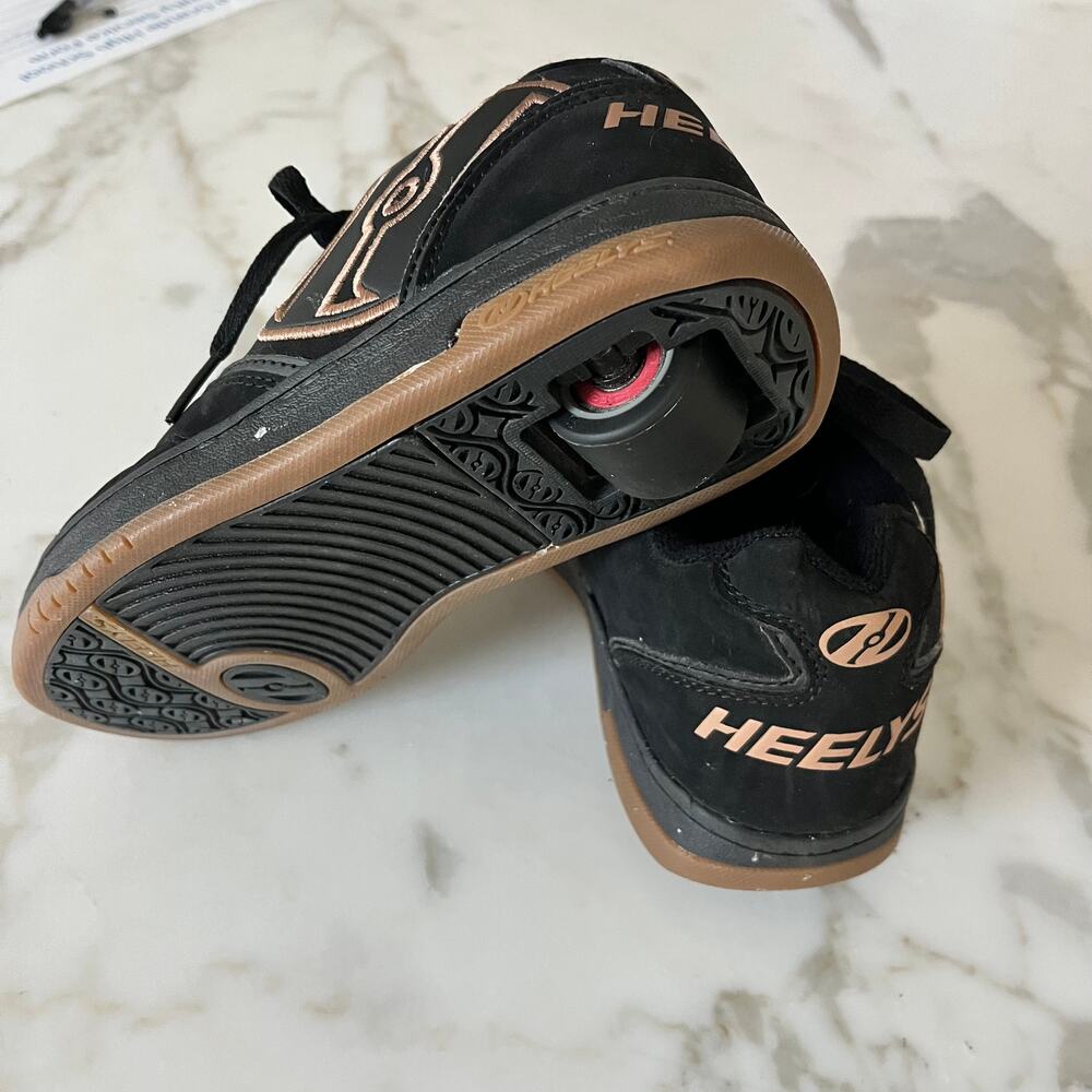 Heelys, mint condition in Black and Gold